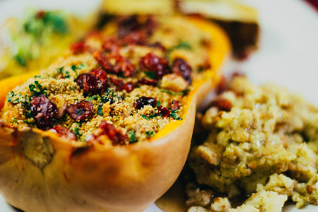 Twice Baked Butternut Squash With Cashew Cheese, Walnuts, and Cranberries